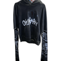 a black hoodie with an image of a skull and crossbones on it